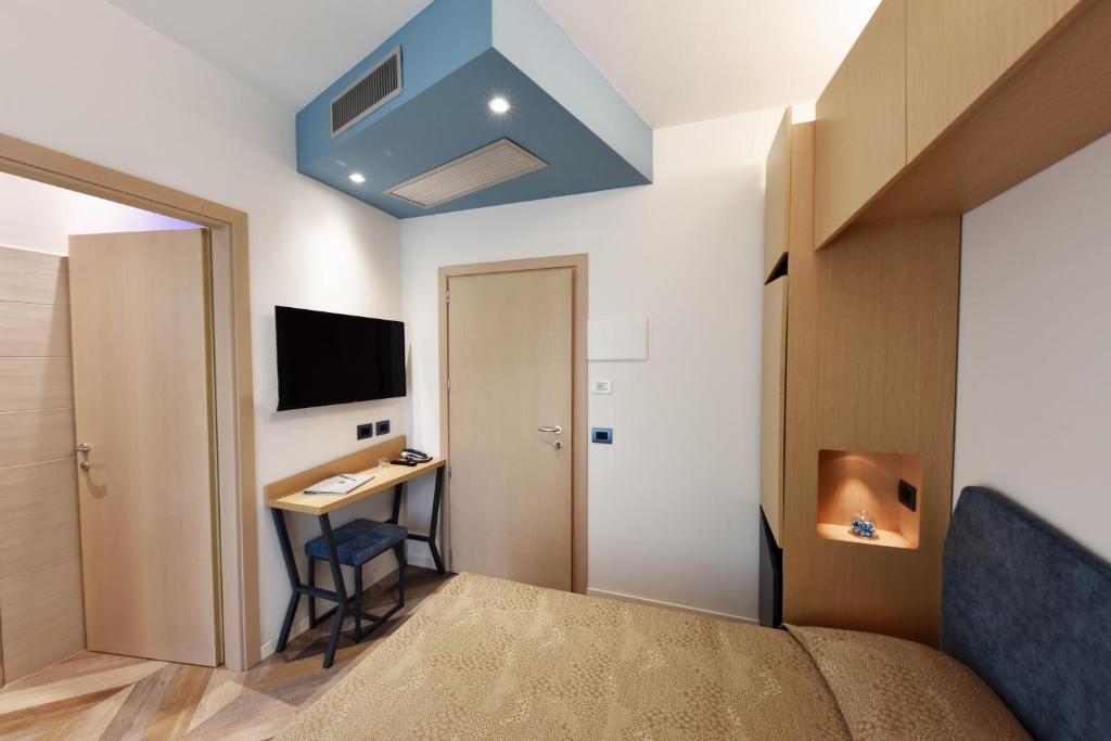 TV a/nebo společenská místnost v ubytování Color Hotel Rimini