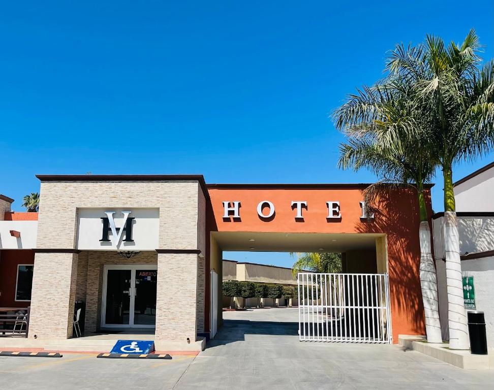 a hotel building with a sign that reads hotel at HOTEL VICTORIA in Ciudad Constitución