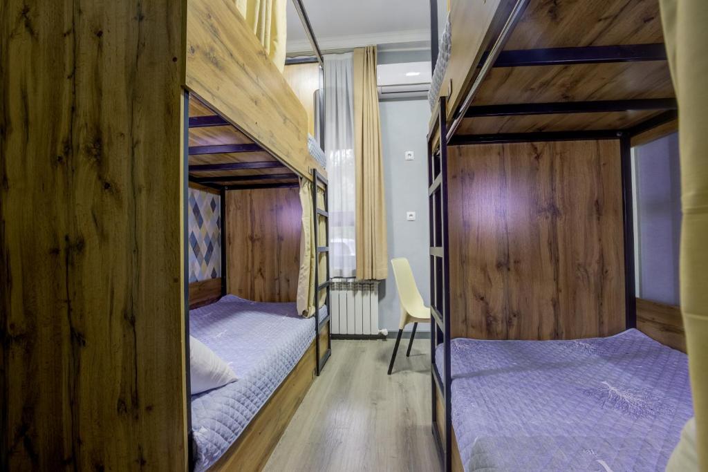 Postel nebo postele na pokoji v ubytování Inter Hotel Bishkek