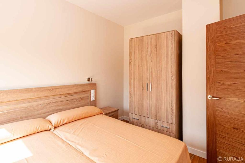 Postel nebo postele na pokoji v ubytování La rexidora appto mamut