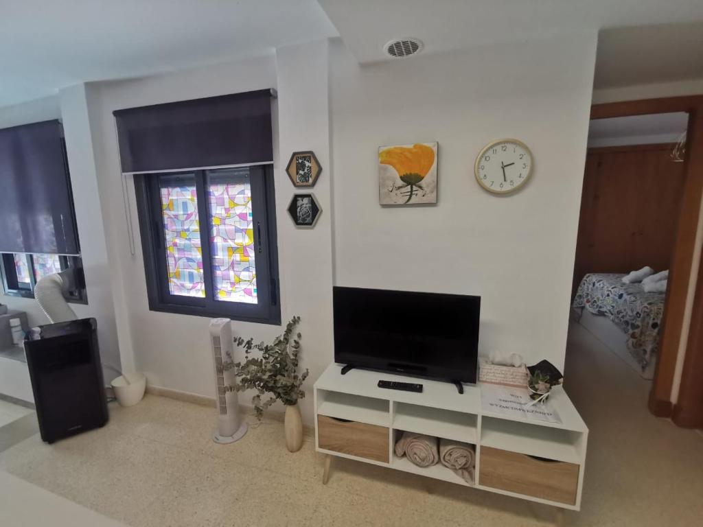 Televízia a/alebo spoločenská miestnosť v ubytovaní La Gema de La Caleta