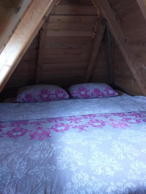 Postel nebo postele na pokoji v ubytování Koliba Kod Begija