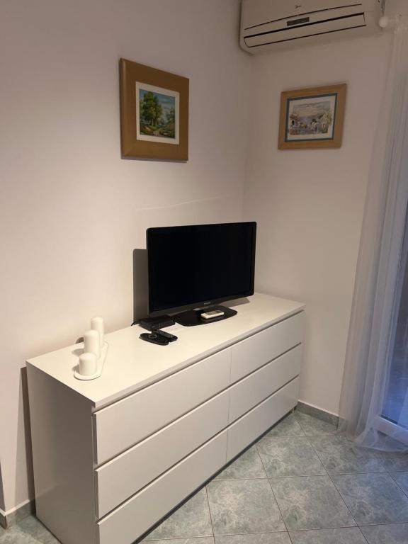 Telewizja i/lub zestaw kina domowego w obiekcie Apartman LOTA