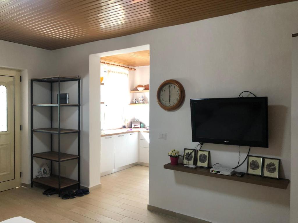 TV a/nebo společenská místnost v ubytování Olive house.