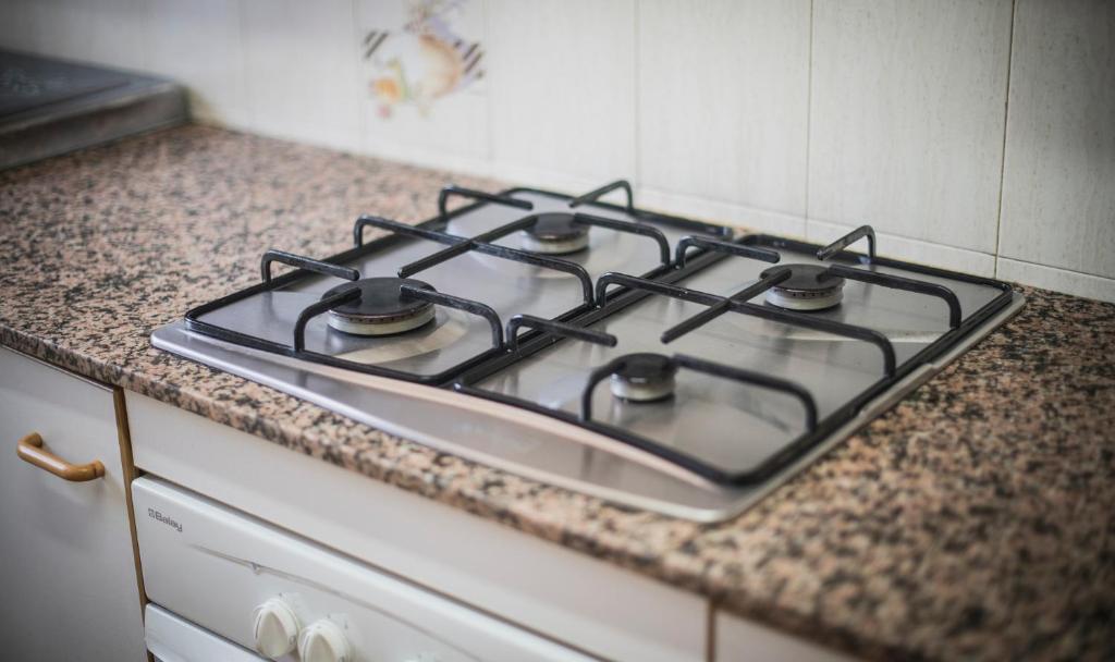 Kuchyňa alebo kuchynka v ubytovaní TarracoHomes, TH156 Casa Roser Familiar y con Piscina Compartida