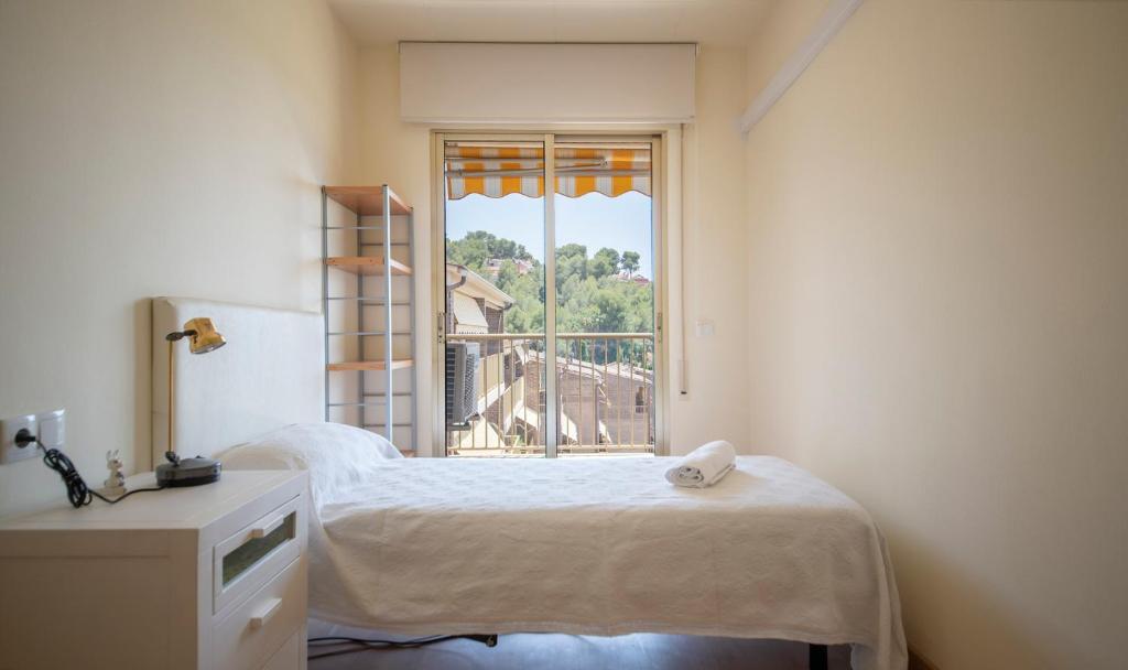 Posteľ alebo postele v izbe v ubytovaní TarracoHomes, TH156 Casa Roser Familiar y con Piscina Compartida