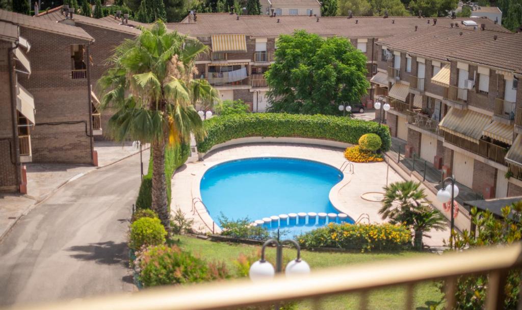 Bazén v ubytovaní TarracoHomes, TH156 Casa Roser Familiar y con Piscina Compartida alebo v jeho blízkosti