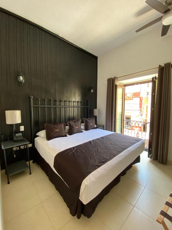 Postel nebo postele na pokoji v ubytování Hotel Plata Condesa
