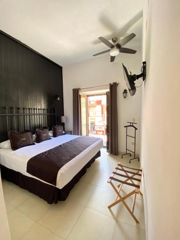 Postel nebo postele na pokoji v ubytování Hotel Plata Condesa