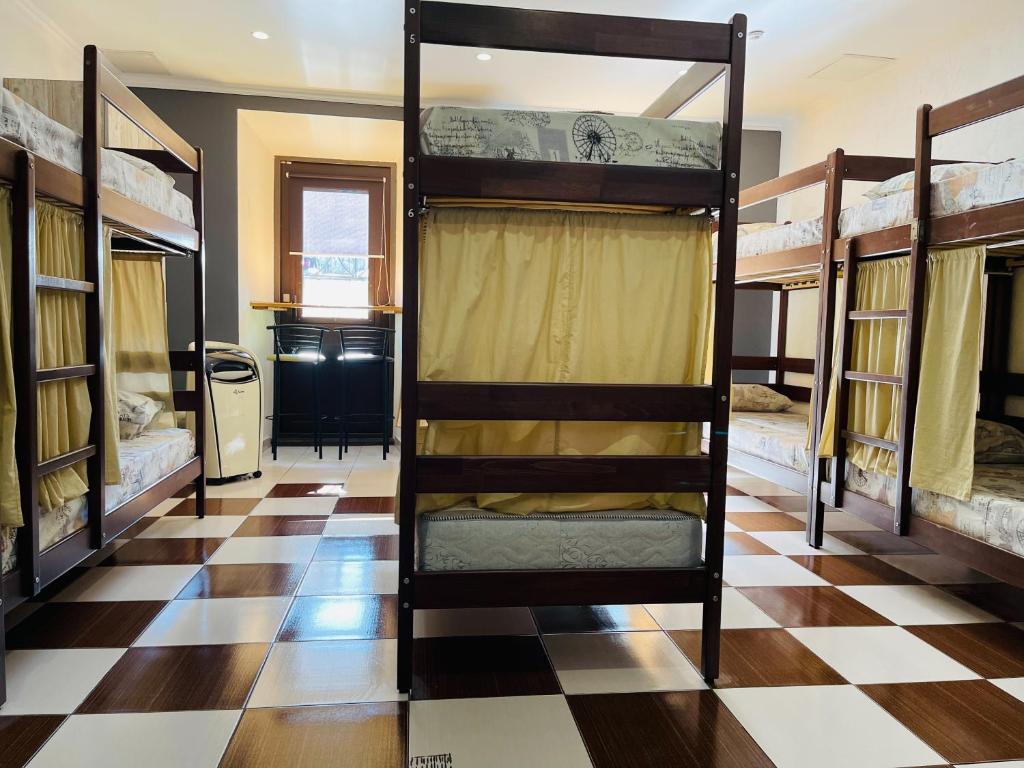 Postel nebo postele na pokoji v ubytování Le Rêve city hostel