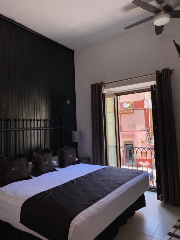 Postel nebo postele na pokoji v ubytování Hotel Plata Condesa