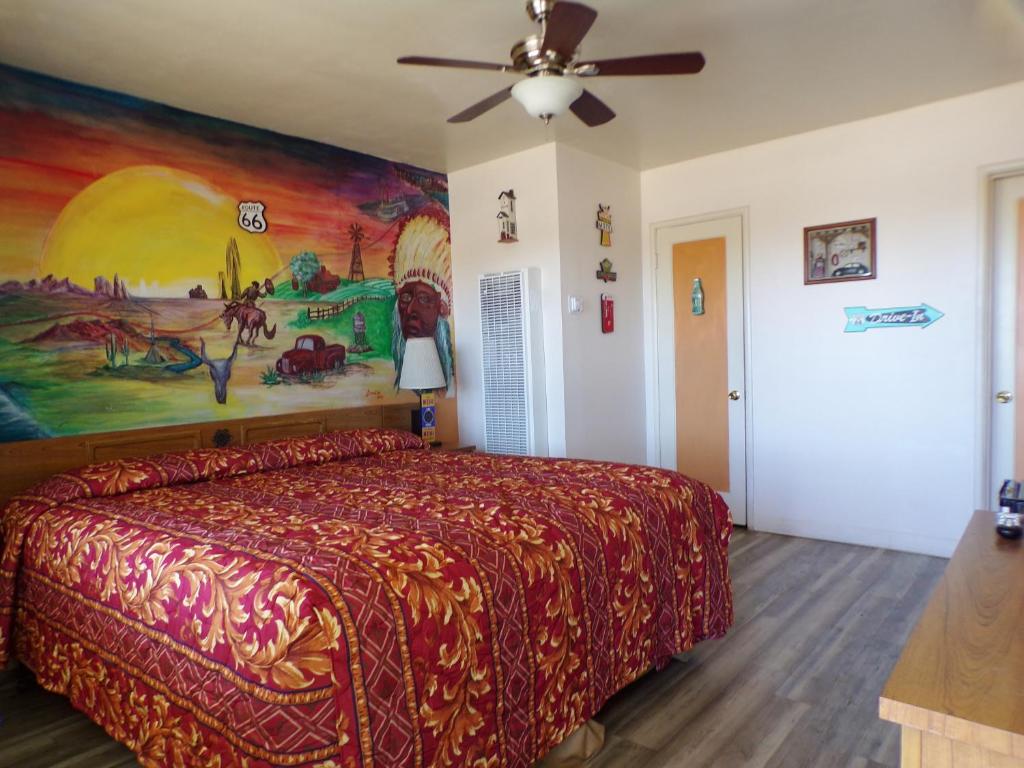 A bed or beds in a room at Cypress Tree Motel