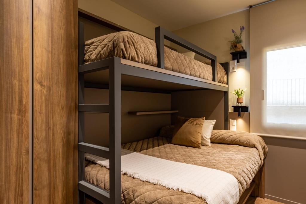 Postel nebo postele na pokoji v ubytování Cerdanya Mountain Residences