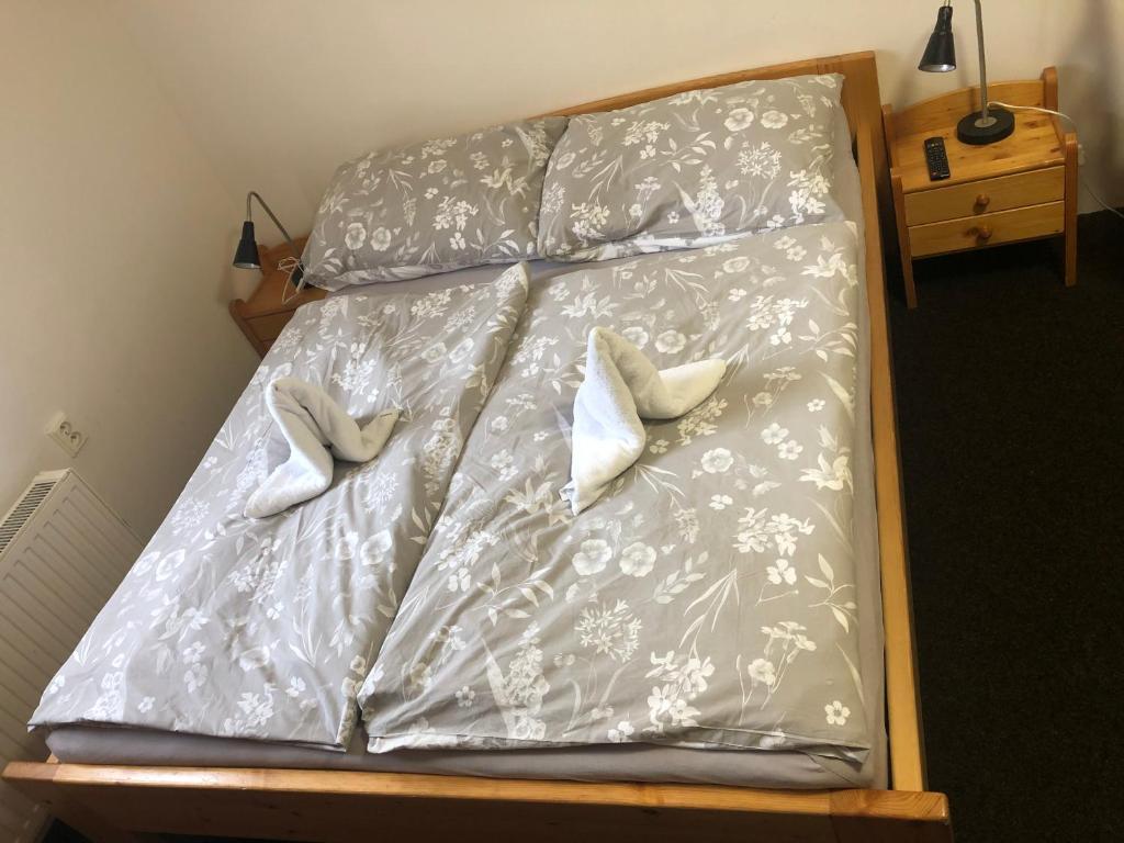 Postel nebo postele na pokoji v ubytování Penzion Štvanice