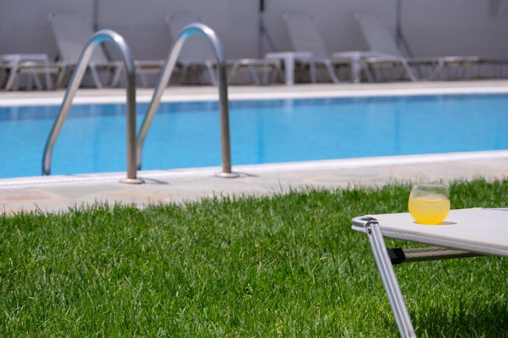 The swimming pool at or close to Katsaros Studios & Apartments
