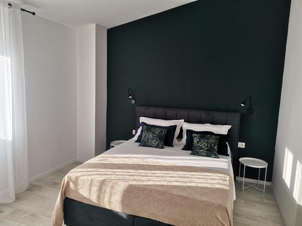 Postel nebo postele na pokoji v ubytování Apartmani Darko