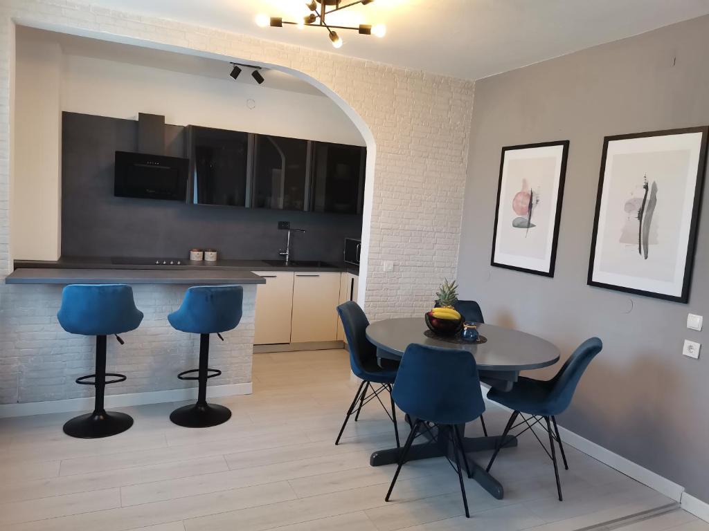 TV a/nebo společenská místnost v ubytování Apartmani Darko