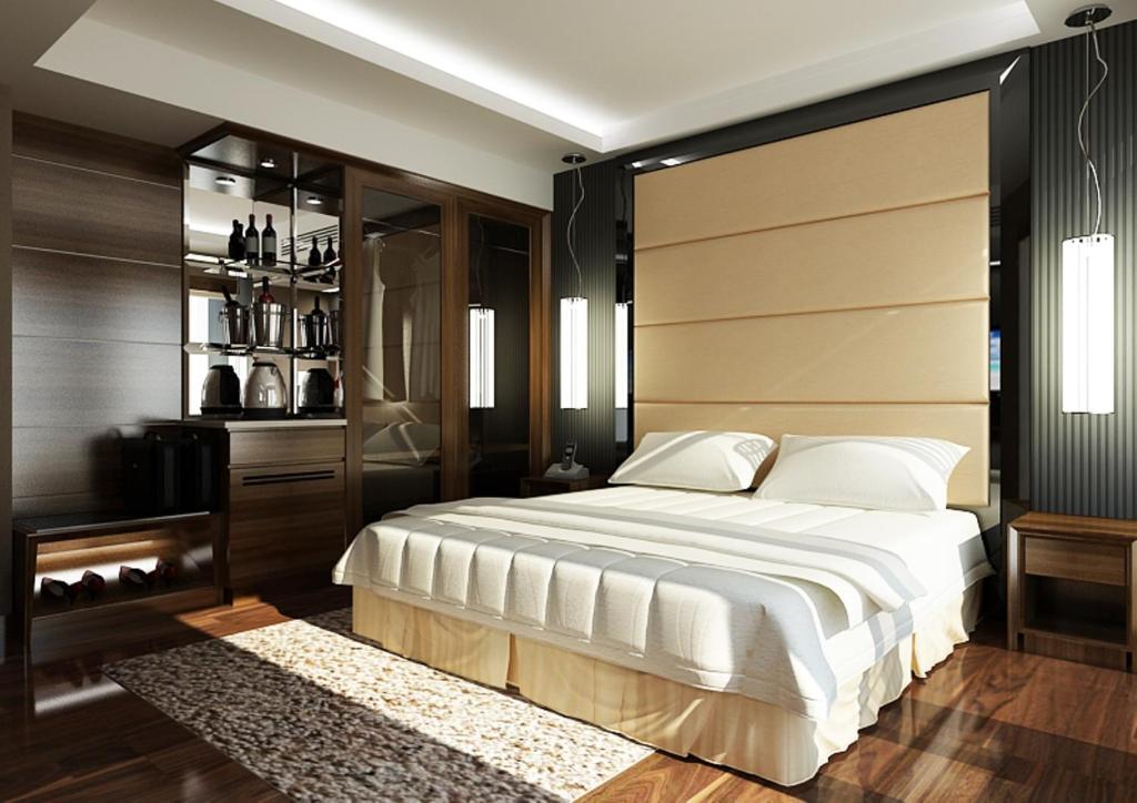 Postel nebo postele na pokoji v ubytování Athena Hotel