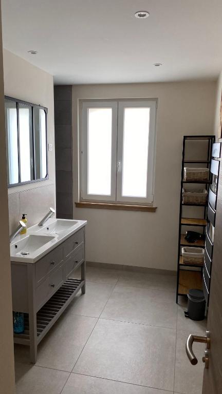 Postel nebo postele na pokoji v ubytování Appartement Le Grand Duc
