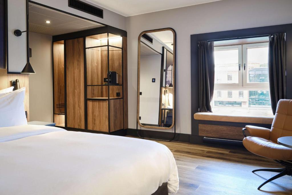 Postel nebo postele na pokoji v ubytování Radisson Blu Royal Garden Hotel, Trondheim