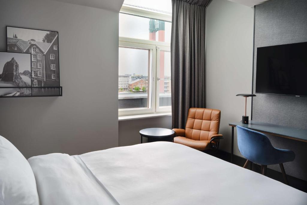Postel nebo postele na pokoji v ubytování Radisson Blu Royal Garden Hotel, Trondheim
