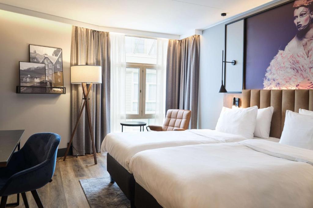 Postel nebo postele na pokoji v ubytování Radisson Blu Royal Garden Hotel, Trondheim