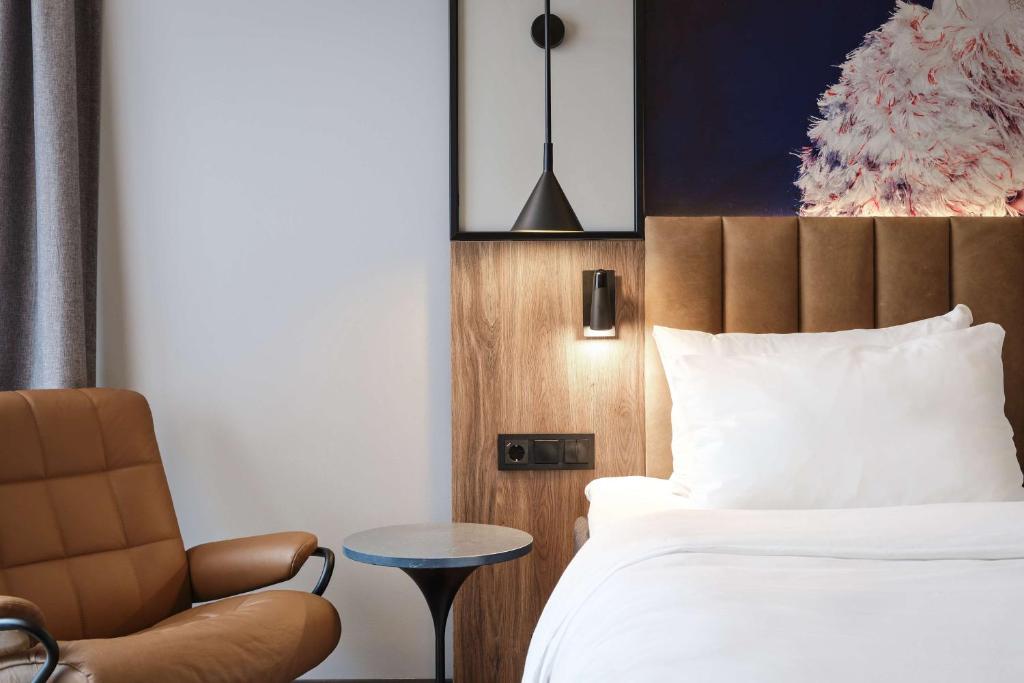 Postel nebo postele na pokoji v ubytování Radisson Blu Royal Garden Hotel, Trondheim