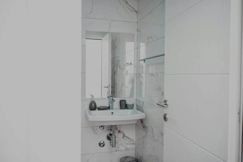 Koupelna v ubytování Apartments Cungu