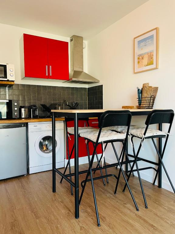 Kuchyň nebo kuchyňský kout v ubytování Cosy Appartement vue mer