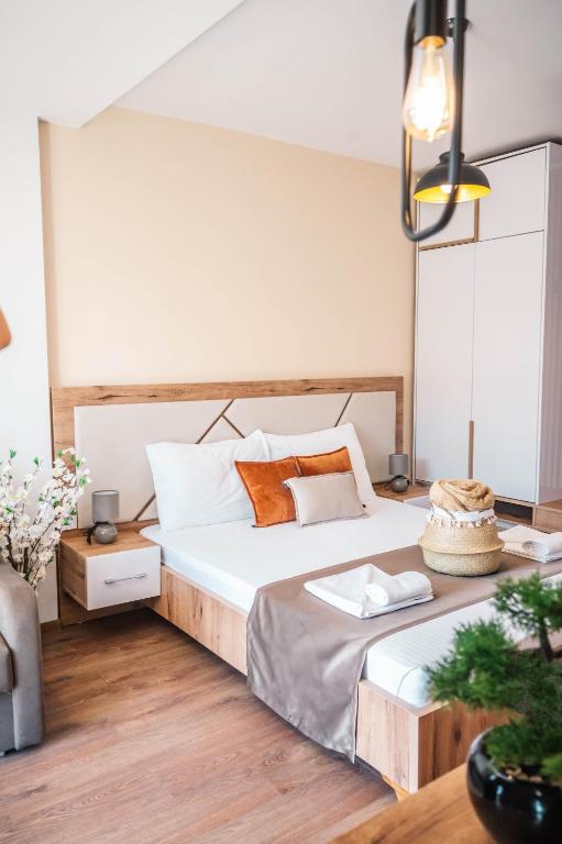 Postel nebo postele na pokoji v ubytování Apartments Cungu