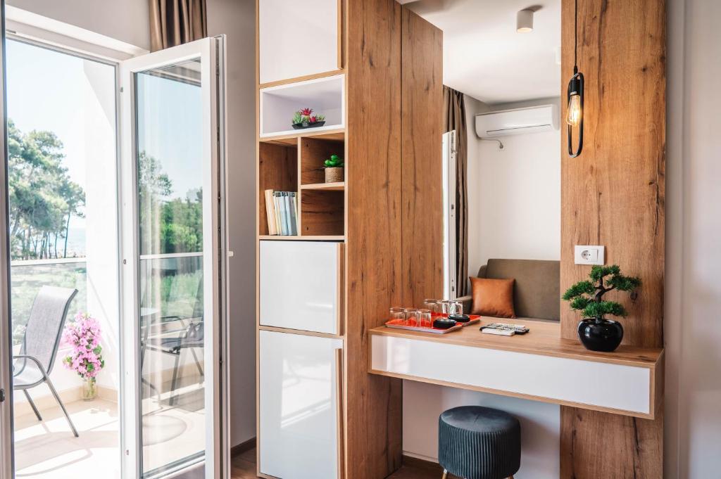Kuchyň nebo kuchyňský kout v ubytování Apartments Cungu