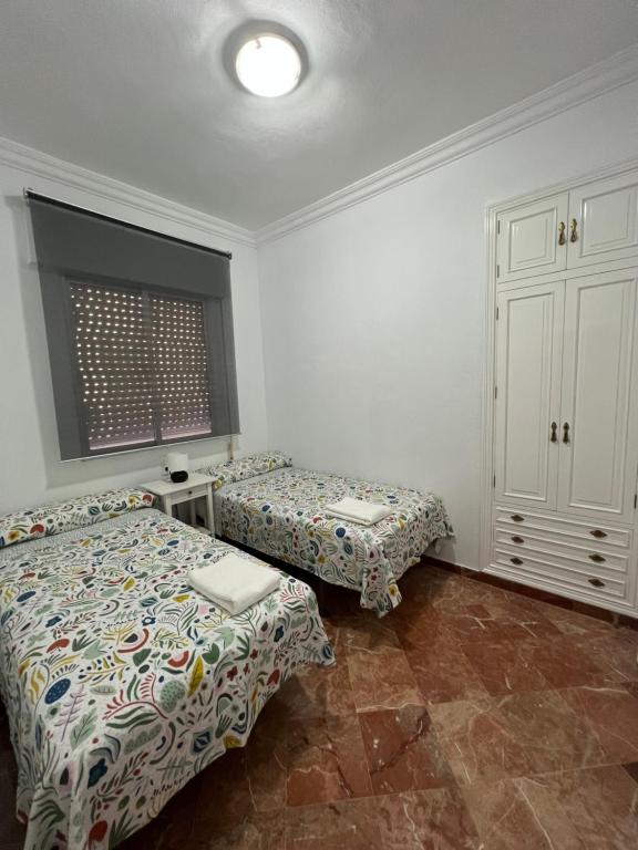 Posteľ alebo postele v izbe v ubytovaní Apartamento Mirador del Tinto centro ciudad