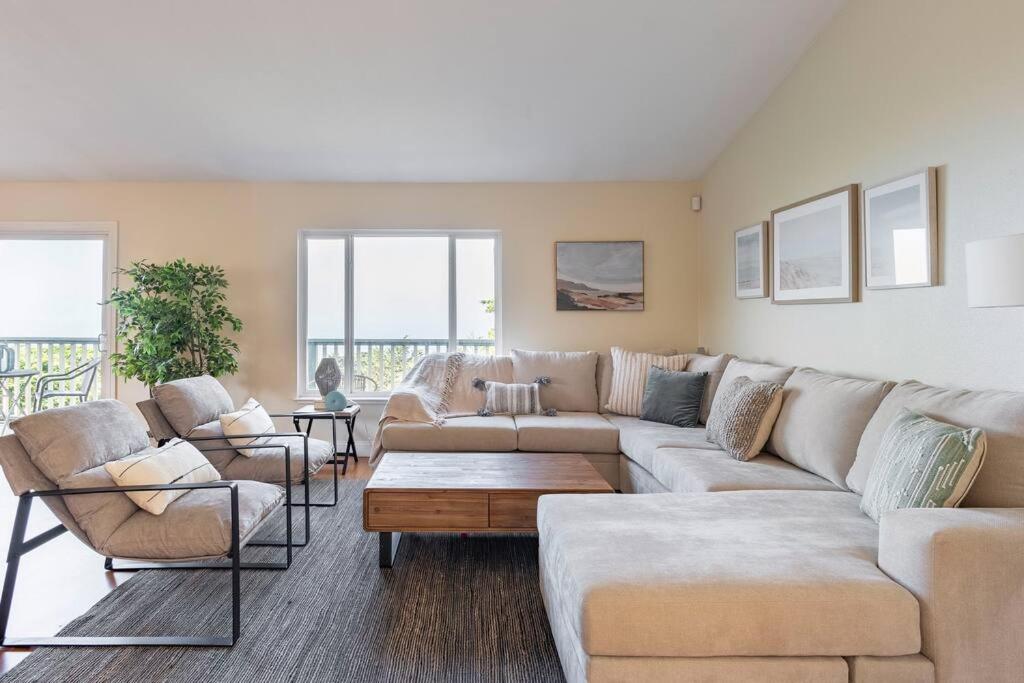 a living room with a large couch and chairs at Ocean View Retreat Mins to Beaches & Trails in Pacifica