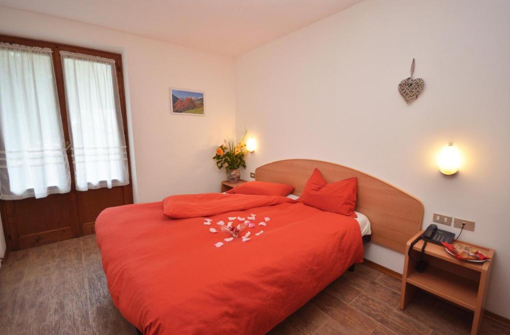 Postel nebo postele na pokoji v ubytování Albergo Sporting
