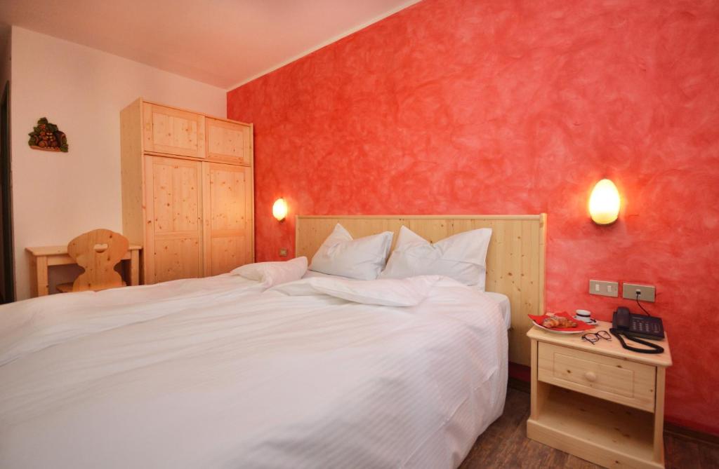 Postel nebo postele na pokoji v ubytování Albergo Sporting