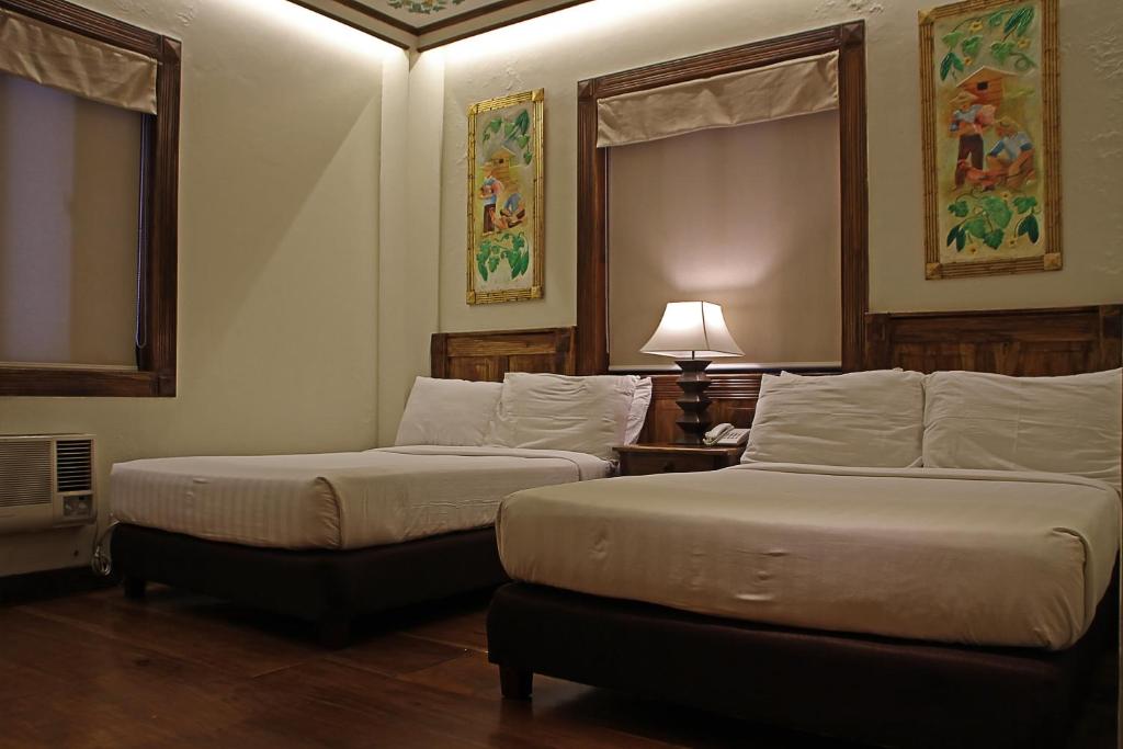 Postel nebo postele na pokoji v ubytování Hotel Veneto De Vigan