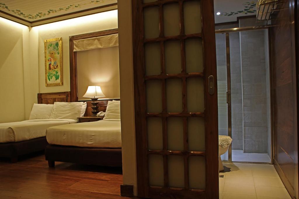 Postel nebo postele na pokoji v ubytování Hotel Veneto De Vigan