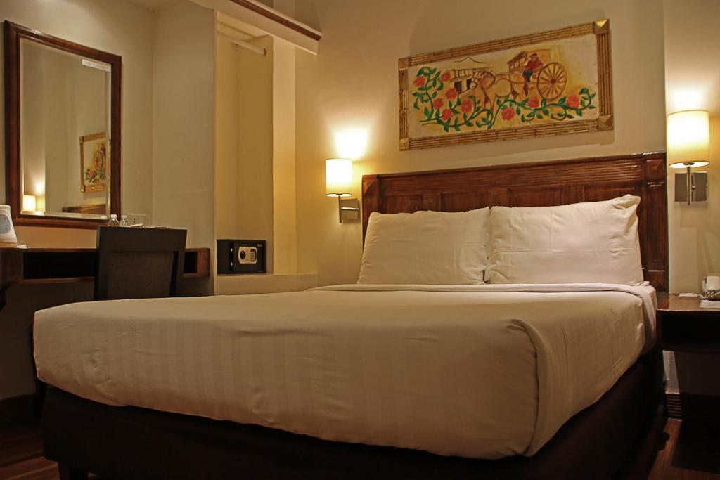 Postel nebo postele na pokoji v ubytování Hotel Veneto De Vigan