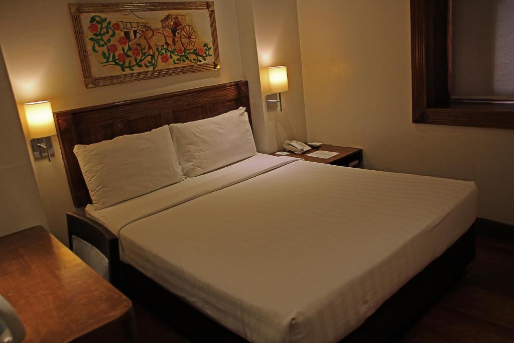Postel nebo postele na pokoji v ubytování Hotel Veneto De Vigan