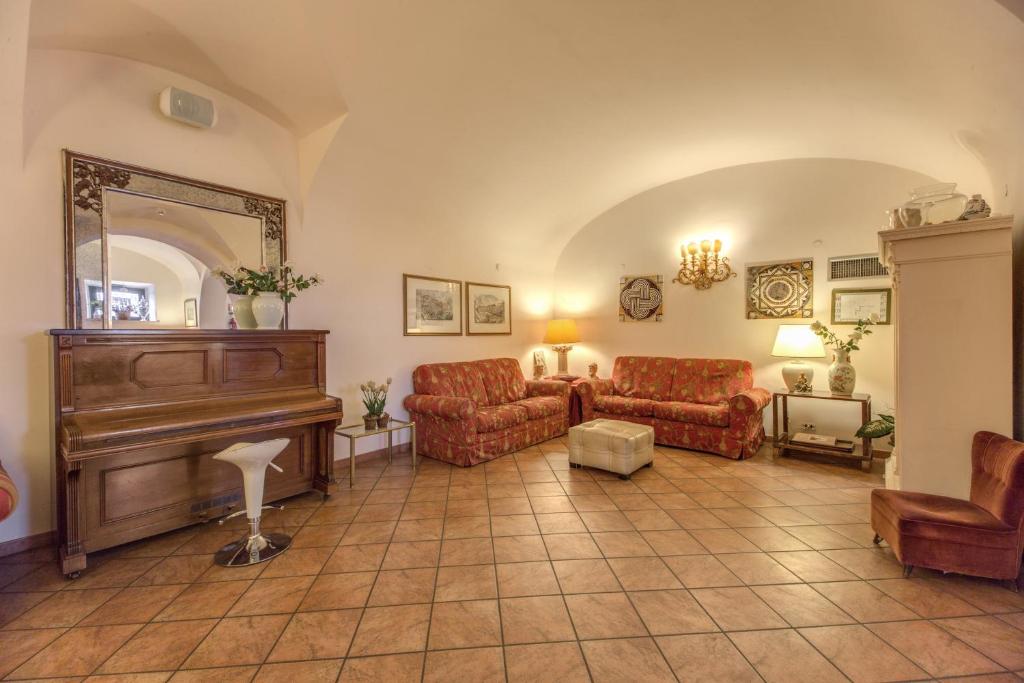 Posezení v ubytování Hotel Corona