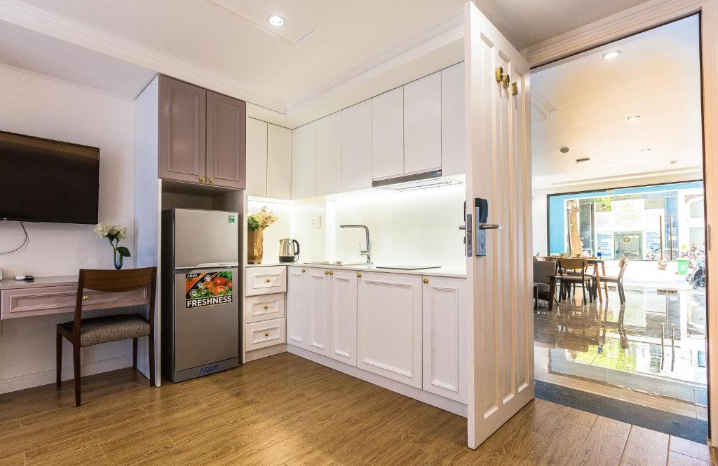Kuchyň nebo kuchyňský kout v ubytování Ngan Ha 2 Apartment