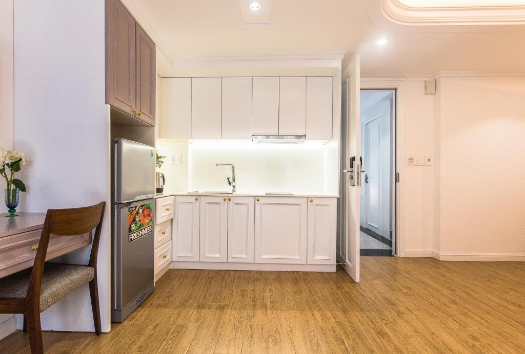 Kuchyň nebo kuchyňský kout v ubytování Ngan Ha 2 Apartment