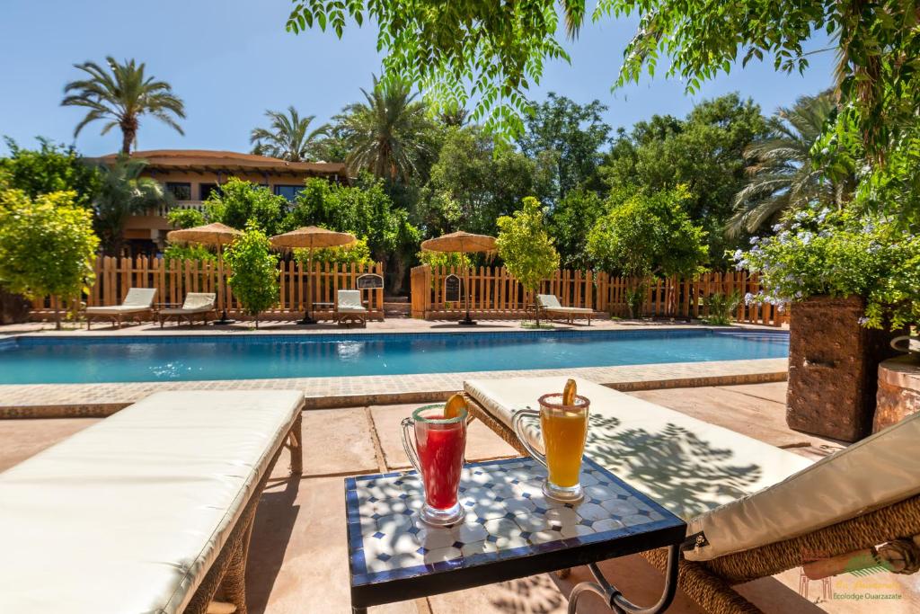 Bazén v ubytování Ecolodge La Palmeraie nebo v jeho okolí