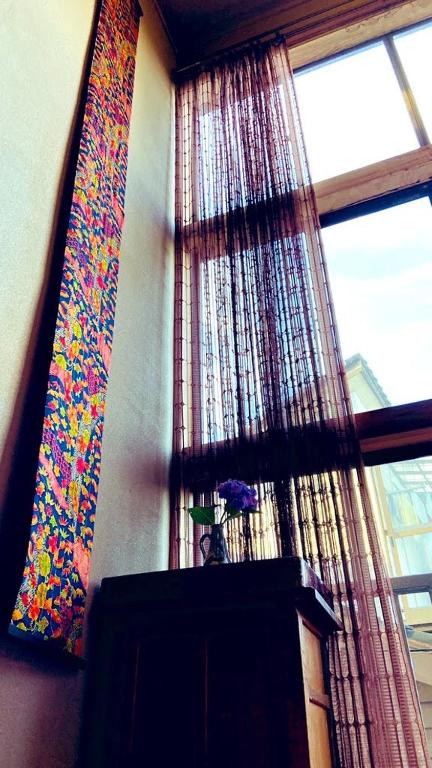 TV a/nebo společenská místnost v ubytování ゲストハウス　華屋 (guest house HANAYA）