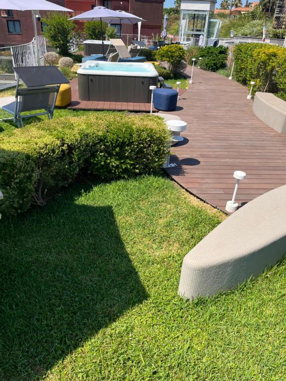 Vonkajšia záhrada v ubytovaní Hotel Malavoglia