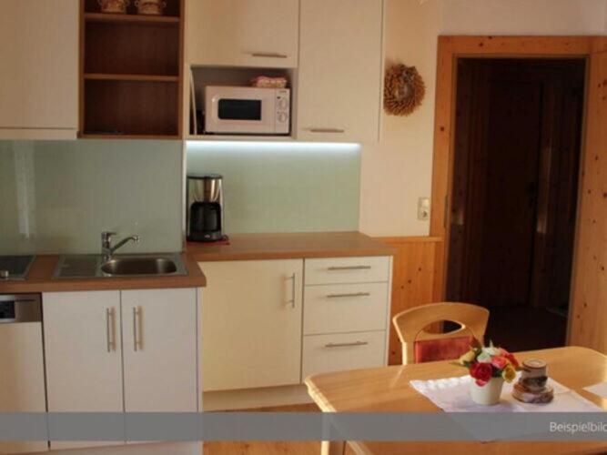 Kuchyň nebo kuchyňský kout v ubytování Apartment at the Achensee