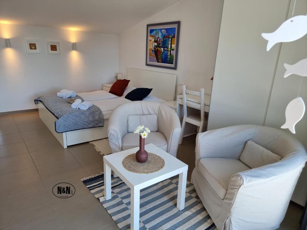 Posezení v ubytování N&N Apartments and Rooms by Locap Group
