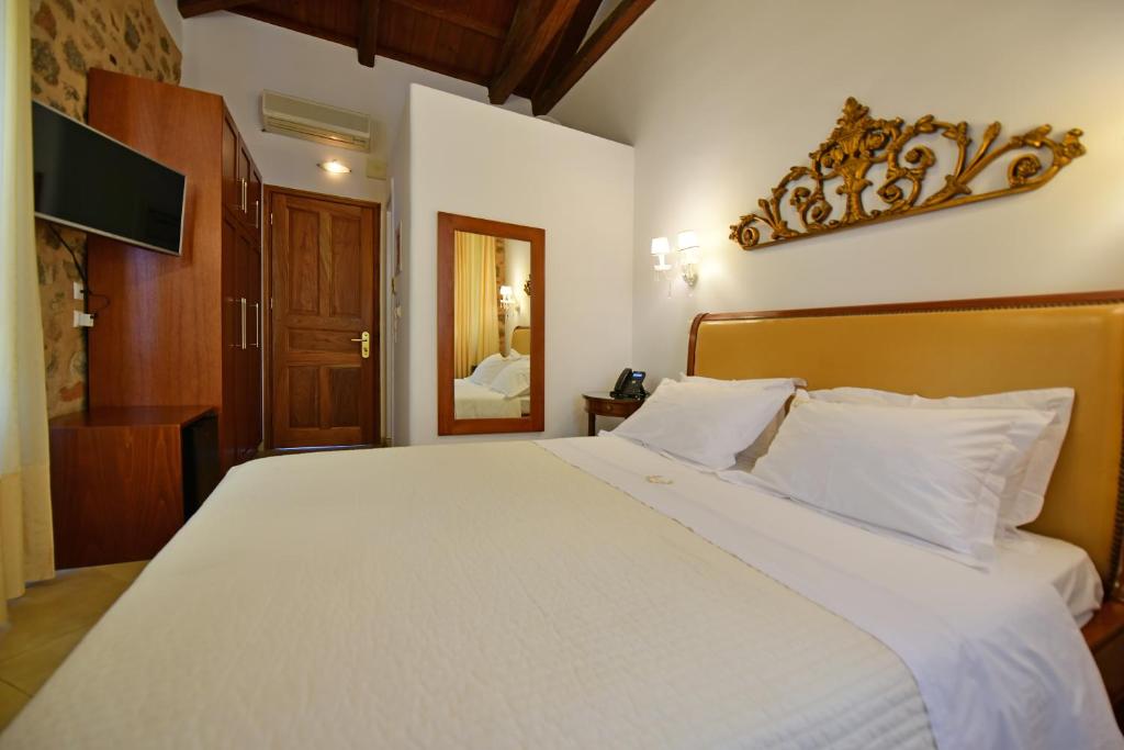 Letto o letti in una camera di Hotel Sophia