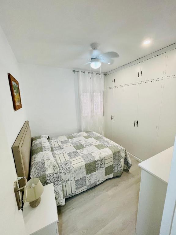 Posteľ alebo postele v izbe v ubytovaní Ecclesia Major Apartment - Vivienda con Fines Turísticos Catedral de Jaen