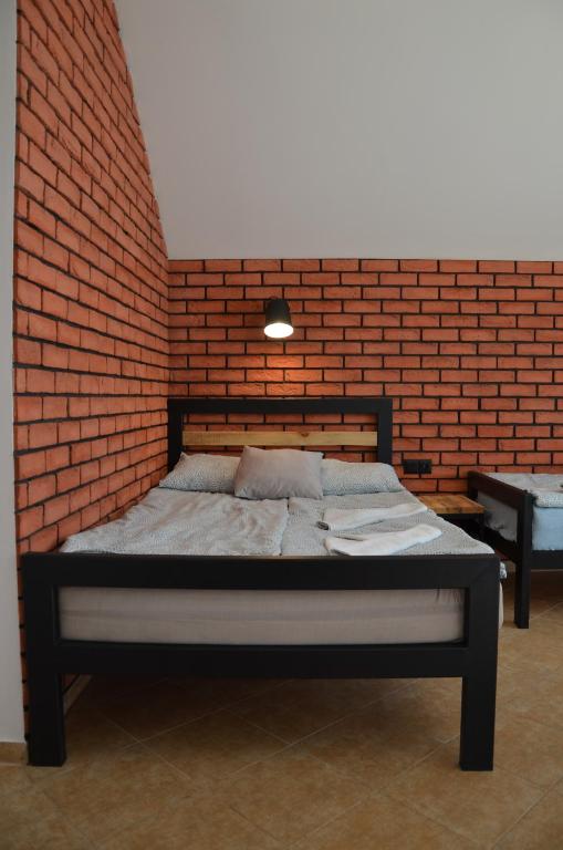 Posteľ alebo postele v izbe v ubytovaní Pensjonat Pod Brzozami